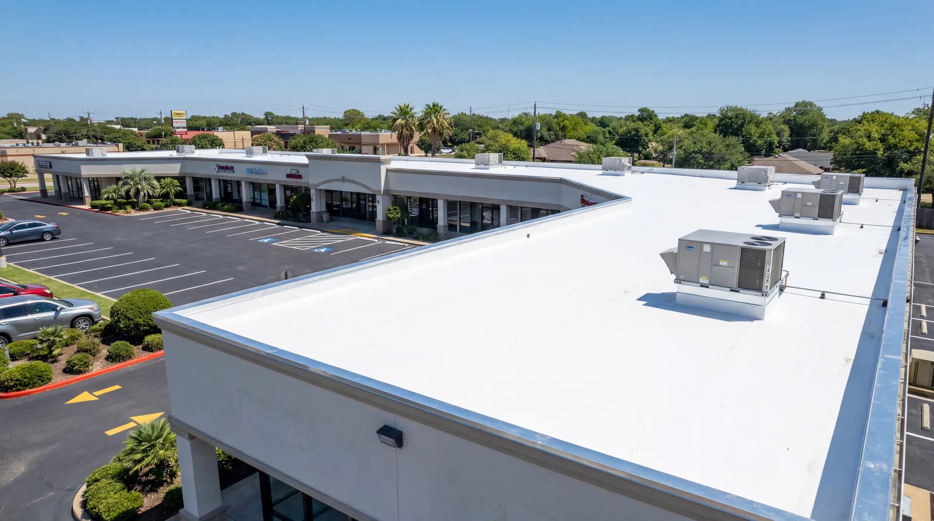 Brand new commercial TPO roof installed by JRH Construction